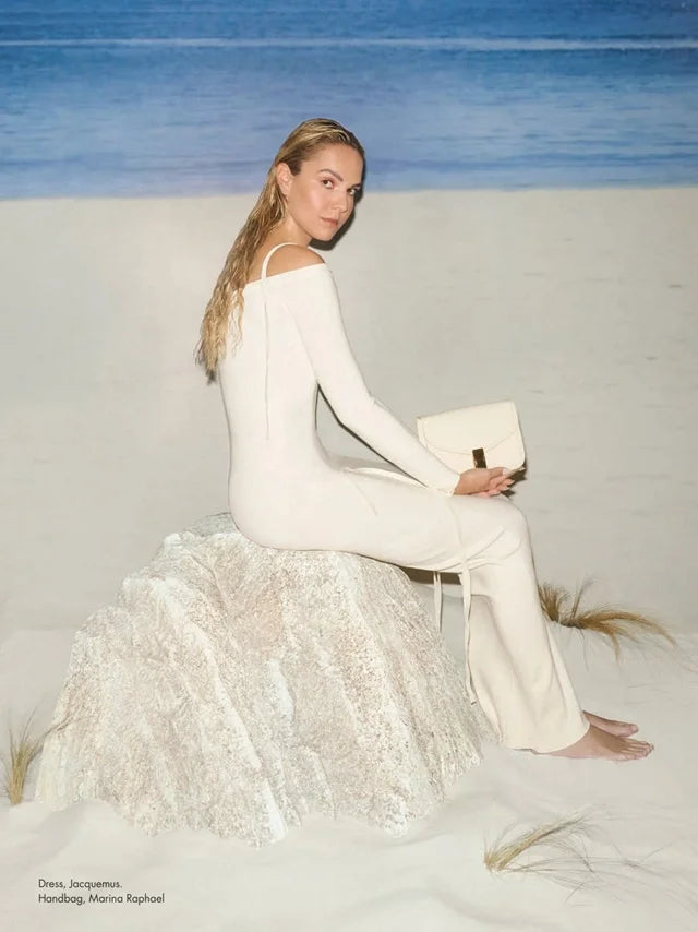 Page from the June 2023 issue of Harper's Bazaar Vietnam magazine featuring: an interview with the designer Marina Raphael, Marina's career in fashion