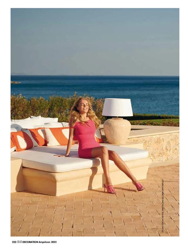 Page from the April 2021 issue of ELLE Decor Greece magazine featuring: an interview with the designer of Marina Raphael, opening the doors to Marina's summer house
