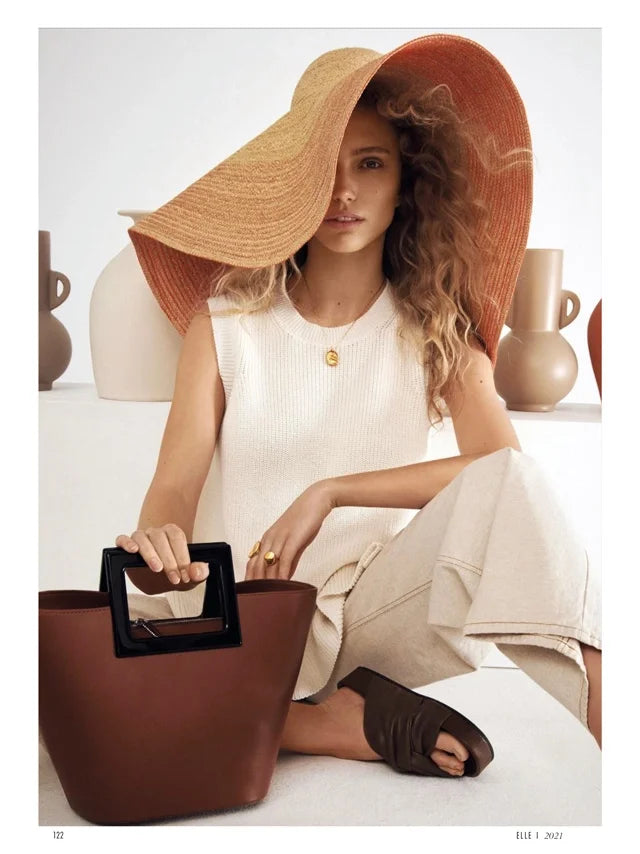 Page from the May 2021 issue of ELLE Germany magazine featuring: the Marina Raphael Mini Riviera in Caramel Leather Handbag