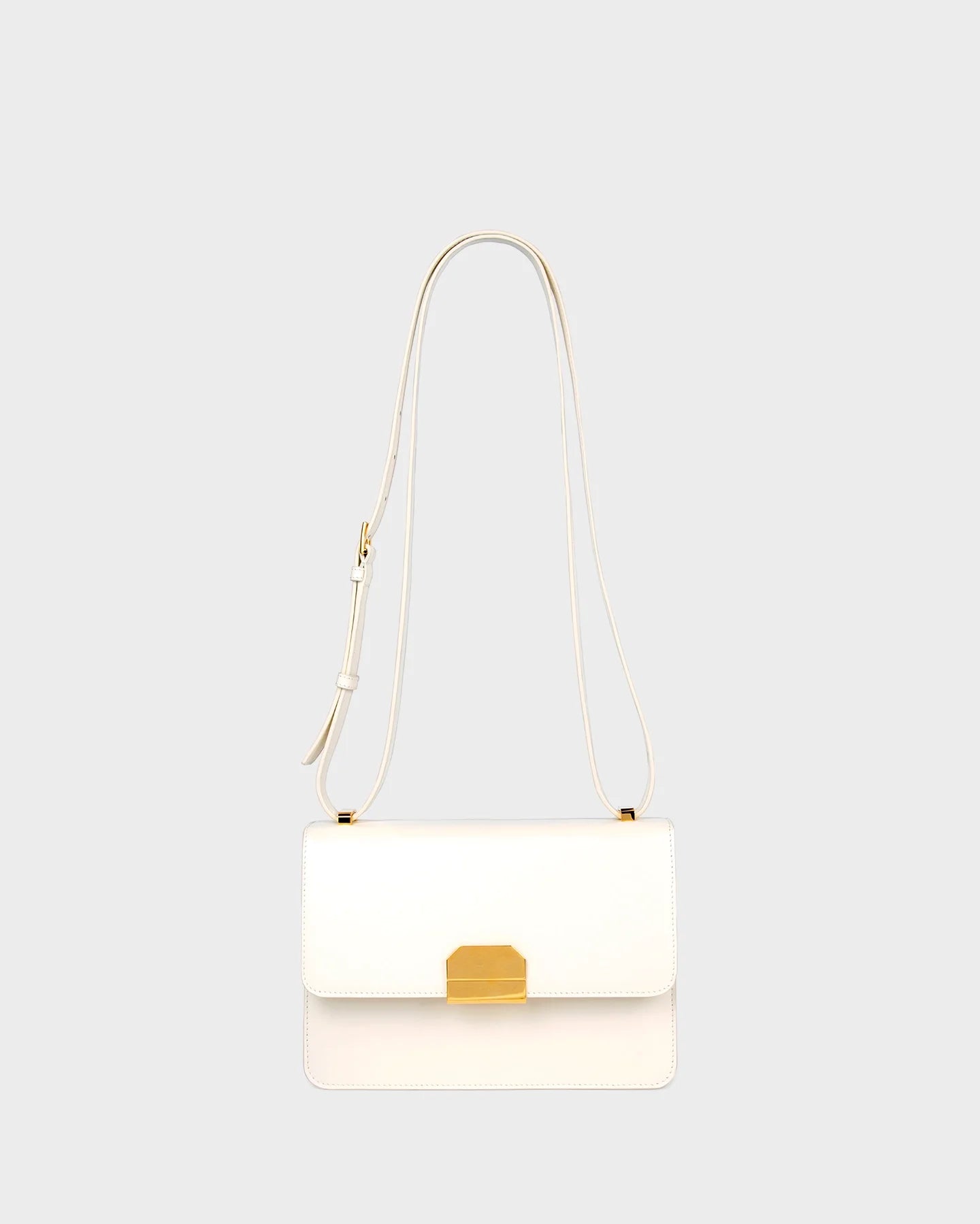 Alex In Cream Leather straight view with strap