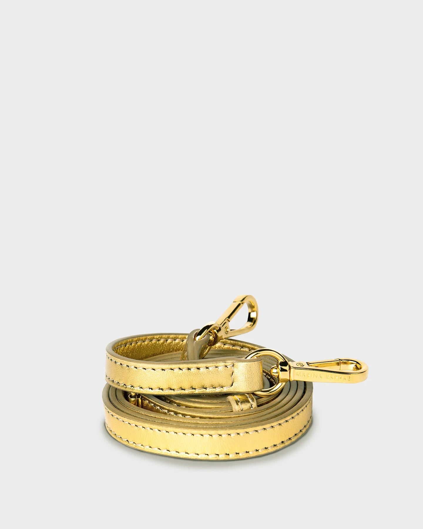 Thin, adjustable, gold, napa leather strap with gold hardware