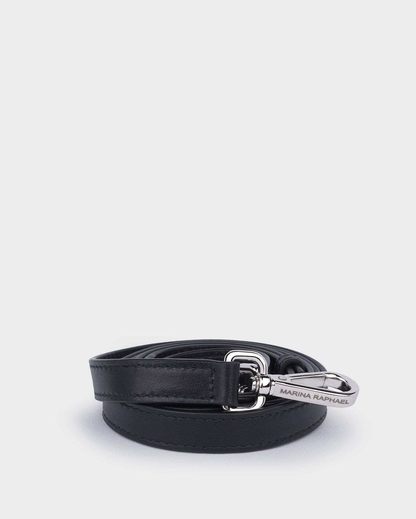 Thick, adjustable, black leather strap with silver hardware