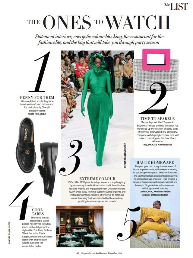 Page from the November 2021 issue of Harper's Bazaar Arabia magazine featuring: the Marina Raphael Evangelie in Silver Crystal and Neon Pink Handbag