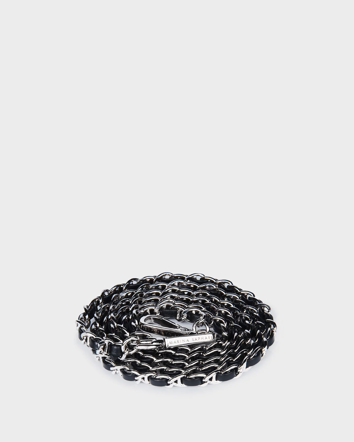Thin, black, napa chain strap, threaded with black saffiano leather with silver hardware