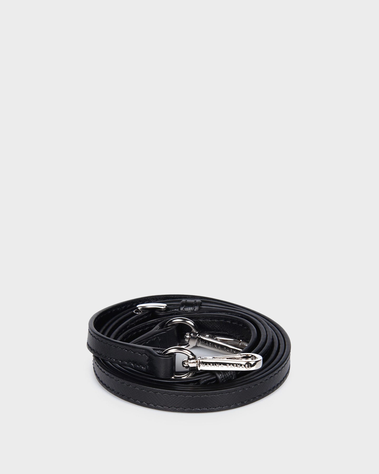Thin, adjustable, black, saffiano leather strap with silver hardware
