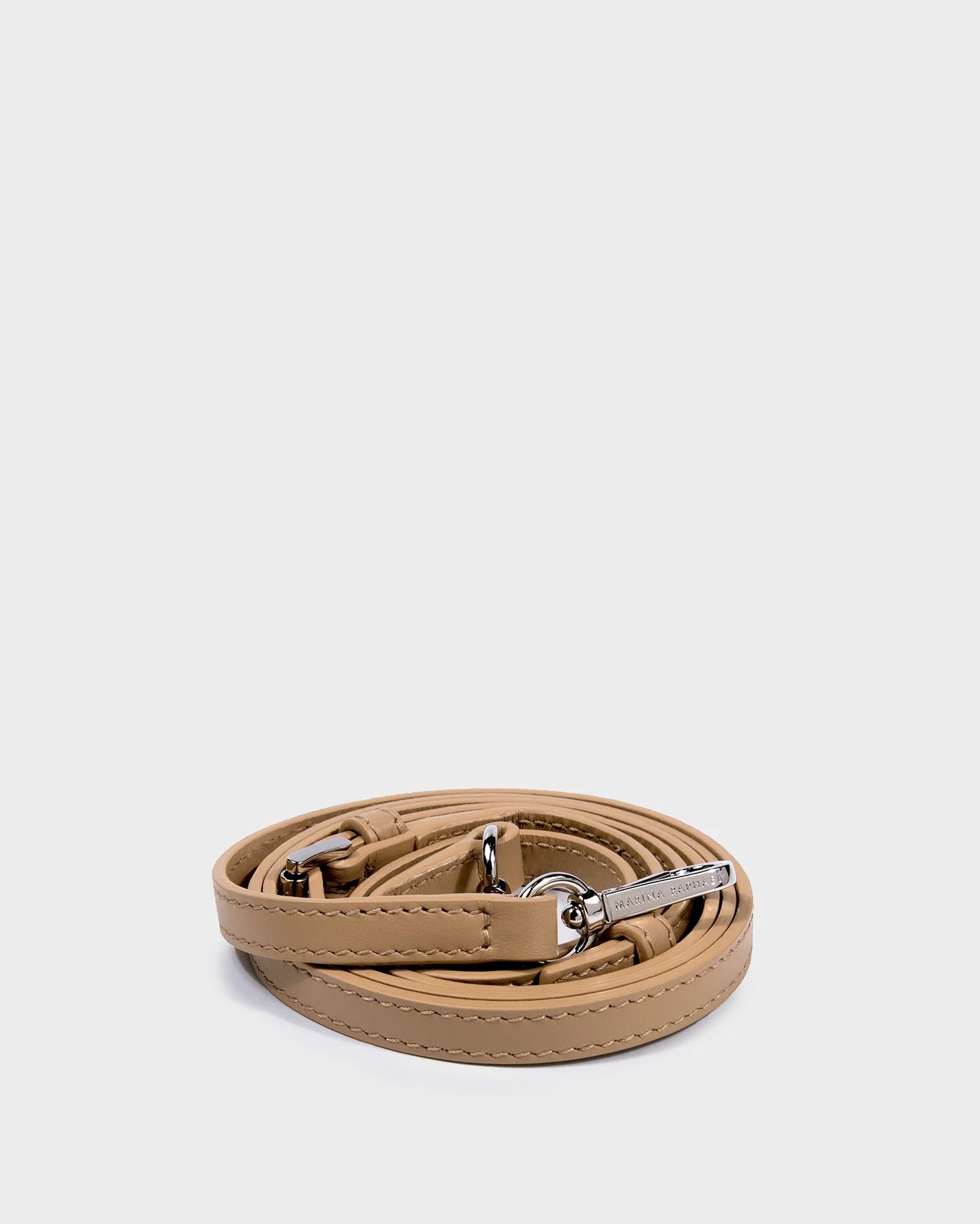 Thin, adjustable, sand, napa leather strap with silver hardware