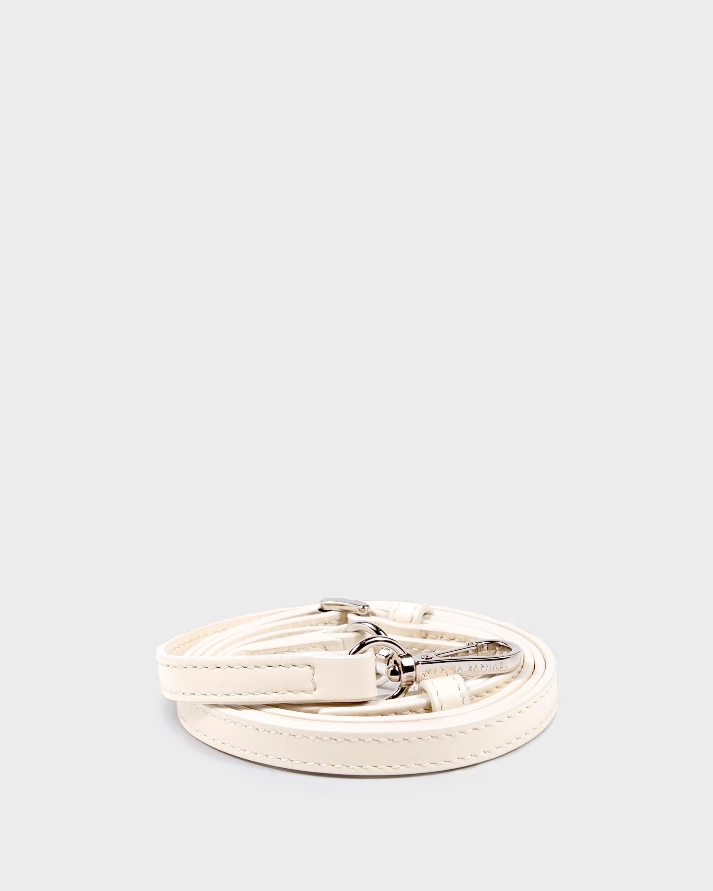 Thin, adjustable, cream, napa leather strap with silver hardware