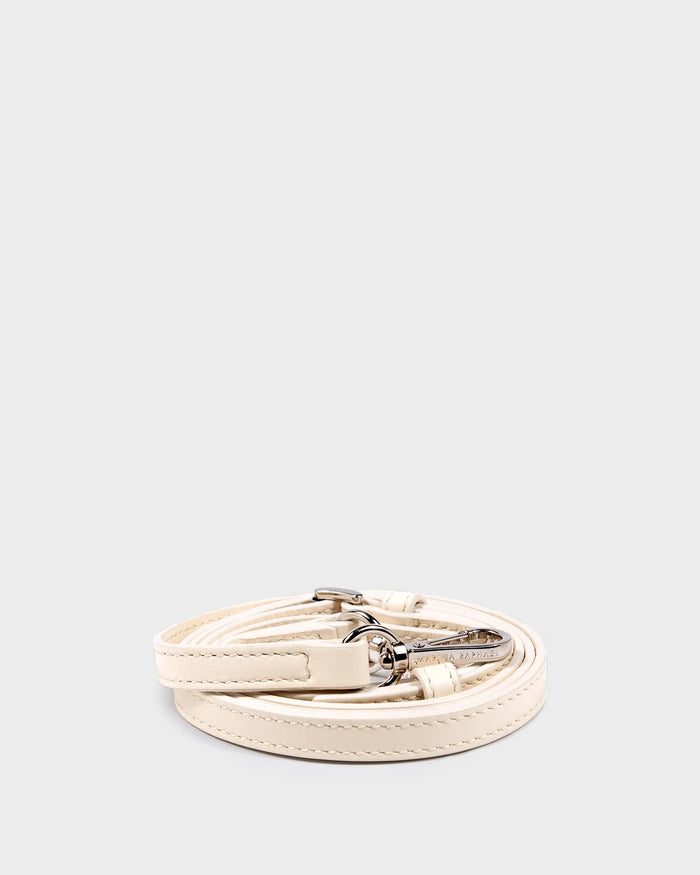 Thin, adjustable, cream, napa leather strap with silver hardware