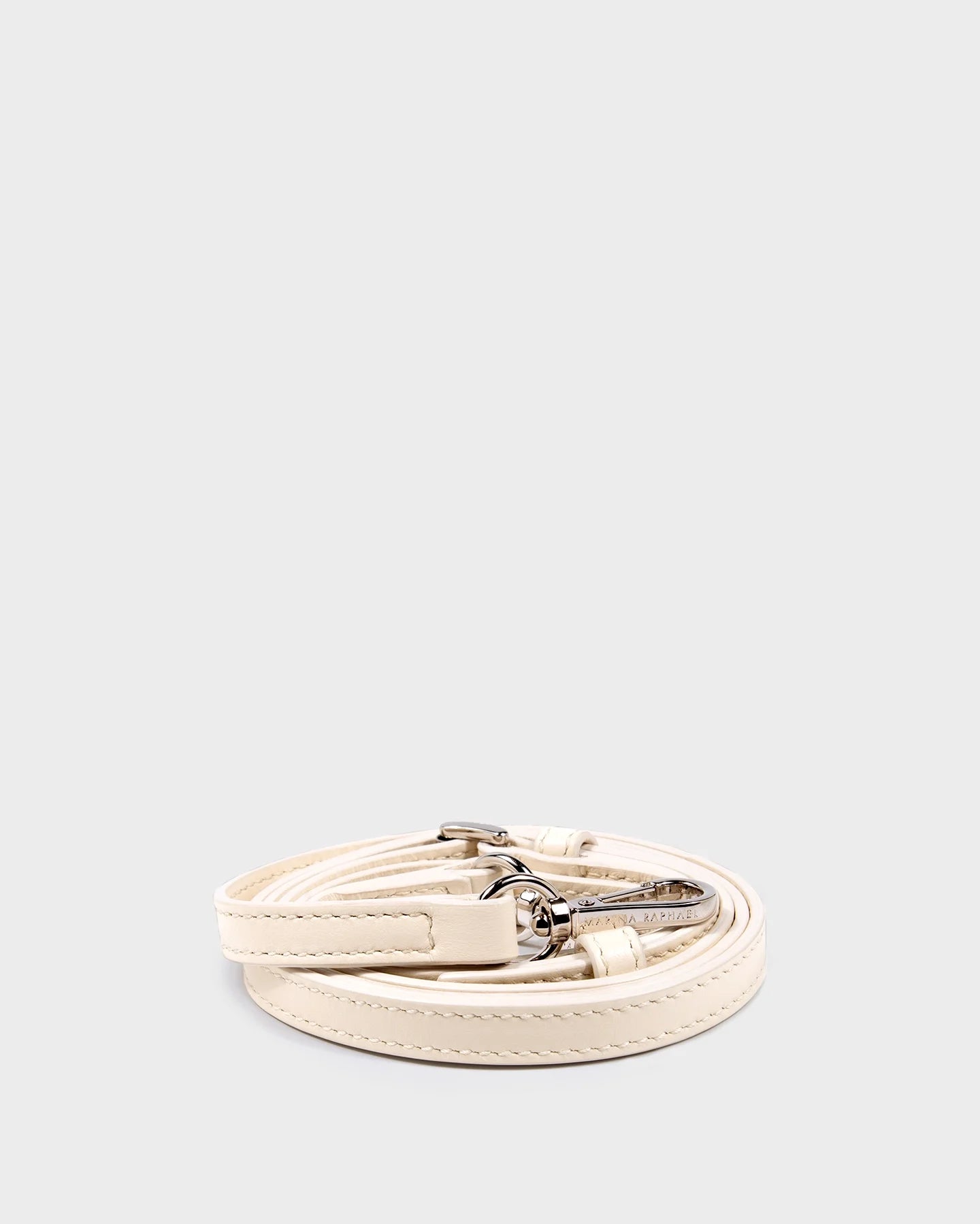 Thin, adjustable, cream, napa leather strap with silver hardware