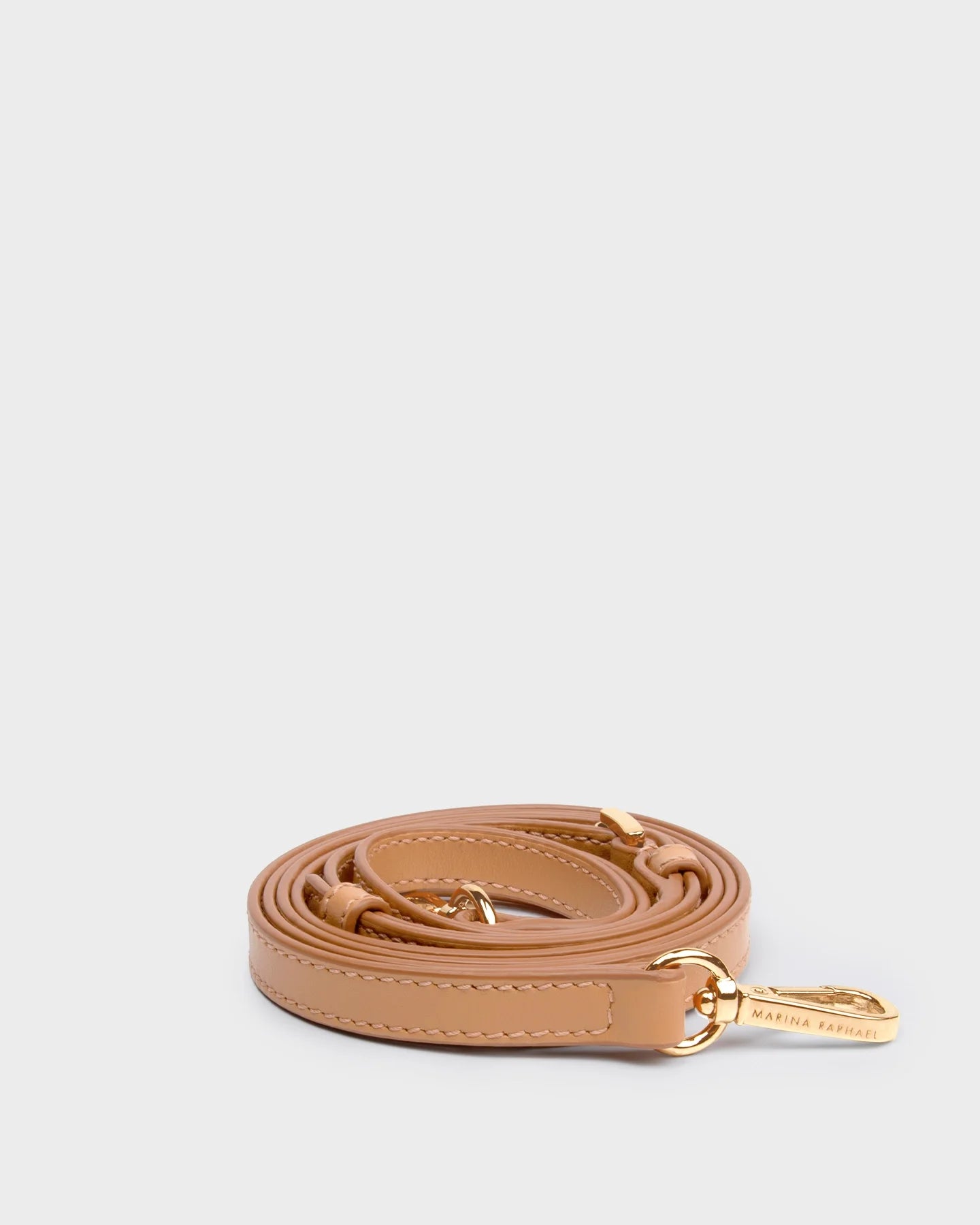 Thin, adjustable, light brown, napa leather strap with gold hardware