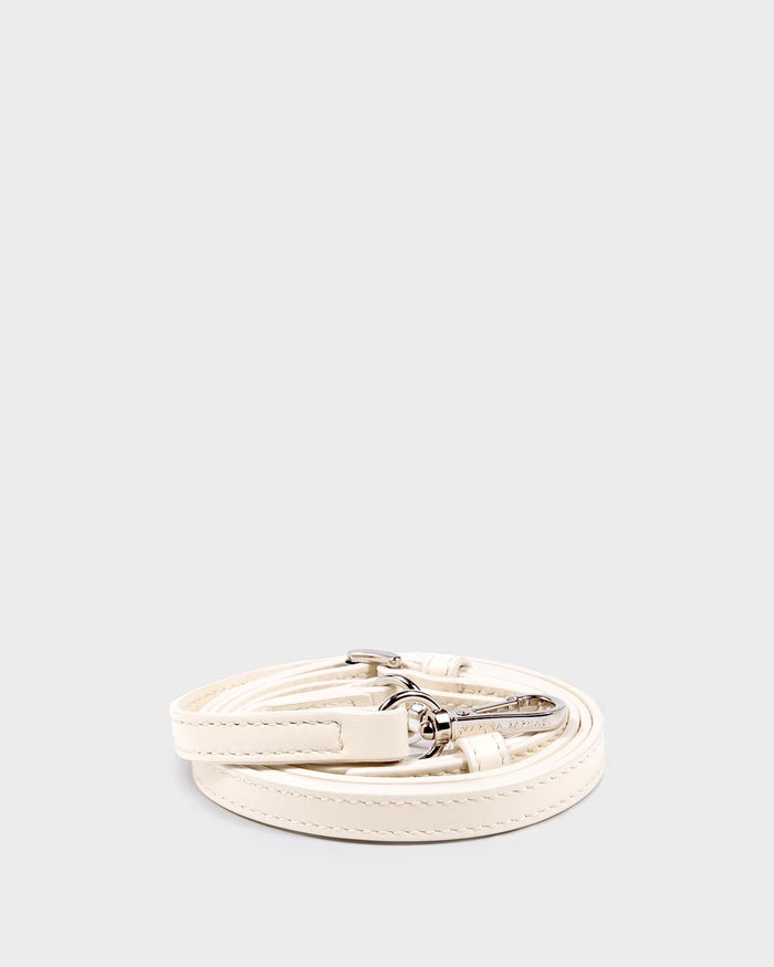 Thin, adjustable, cream, napa leather strap with silver hardware