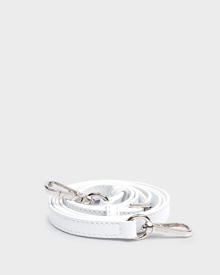 Thick, adjustable, white, napa leather strap with silver hardware